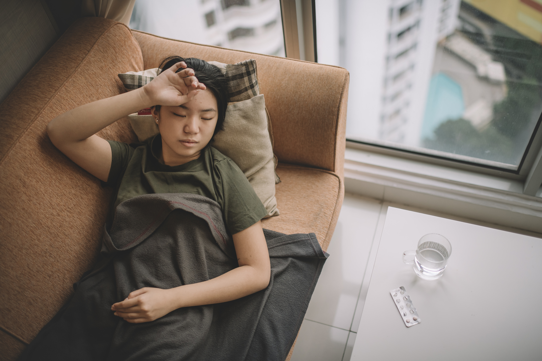 A woman recovers from waste on the sofa Recovery waste