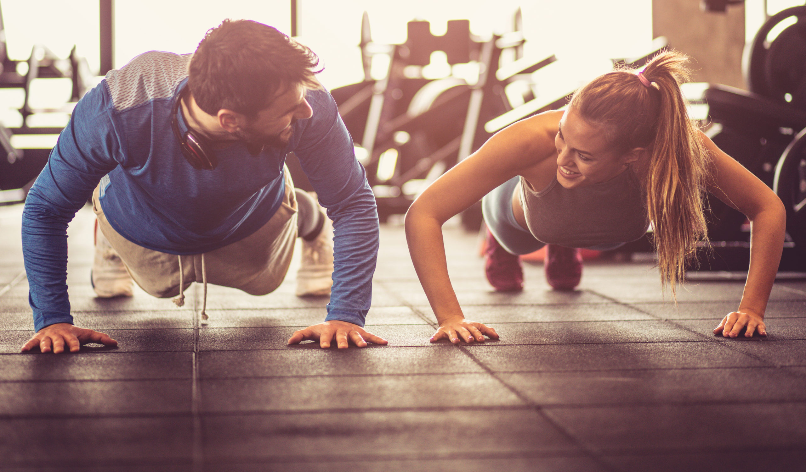 Two People Do Pushups While Smiling at Each Other | Bodyweight vs Weight Training