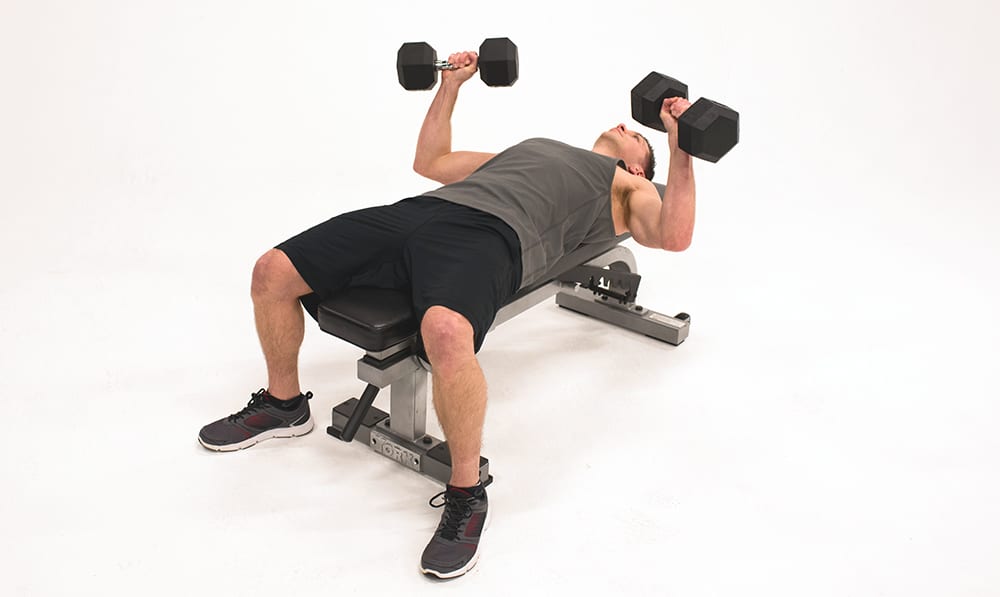 Man Holds Static Bench Press with Dumbbells | Isometric Exercise