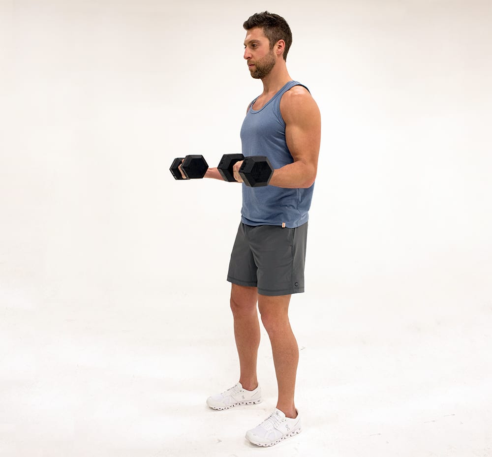 Man Does Static Hold of Dumbbell Curls | Isometric Exercise