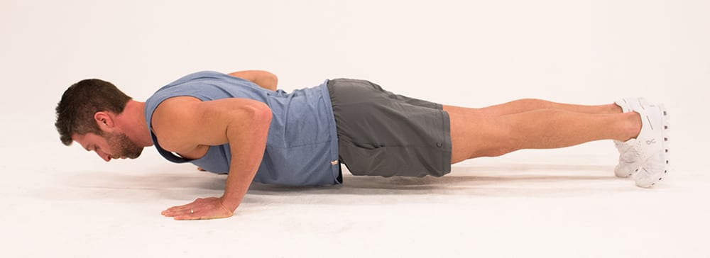 Man Holds Static Push-Up | Isometric Exercise