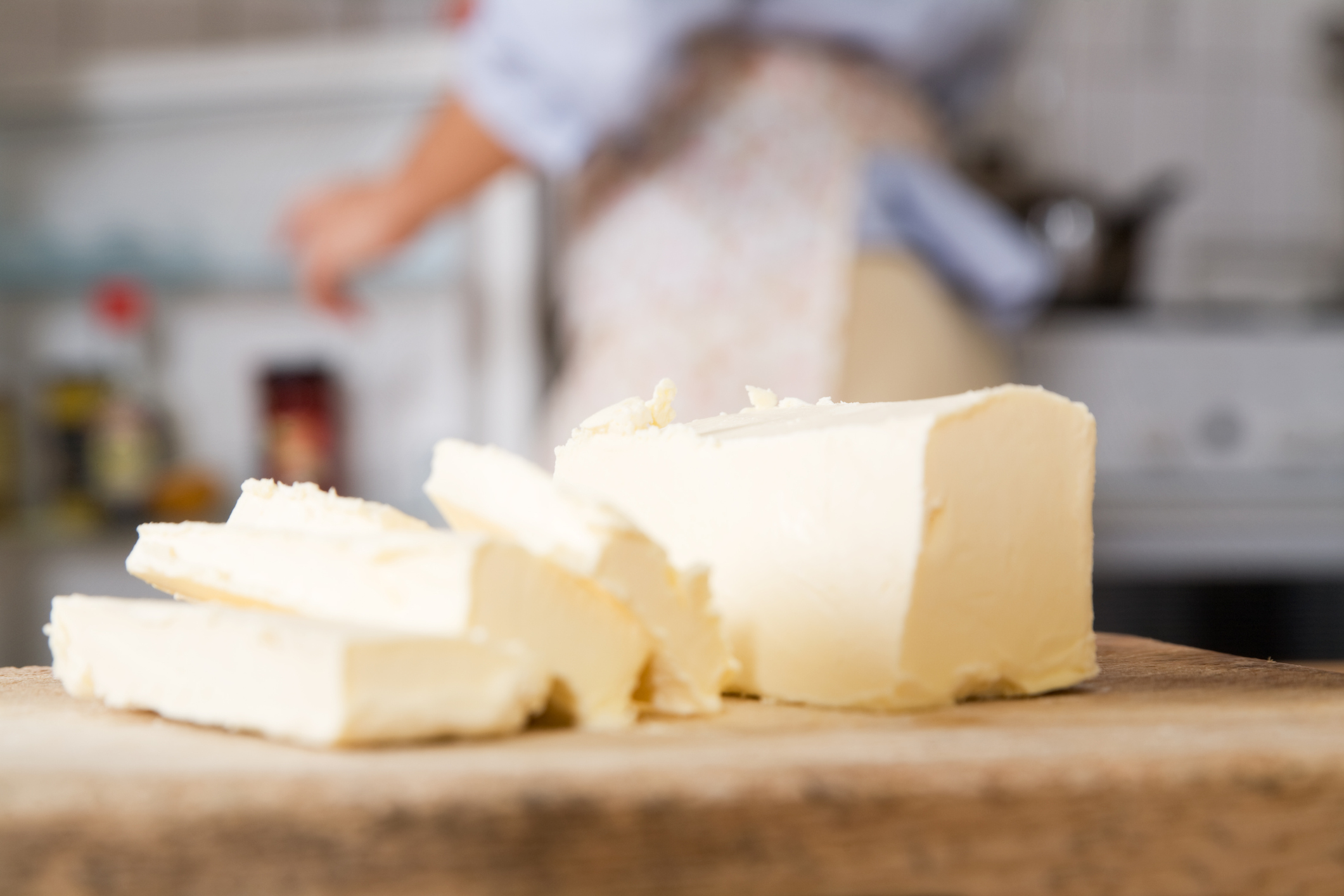 Slices of Butter on Cutting Board. | Ultra Processed Foods