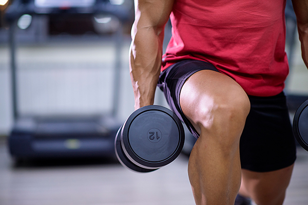 Man Holds Dumbbell | Rest Between Sets