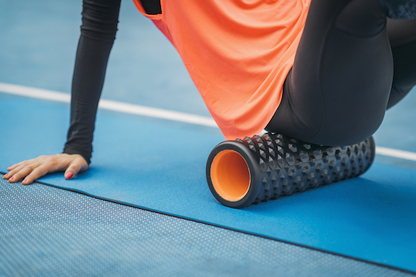 Woman Uses Foam Roller on Matt | What is Fascia