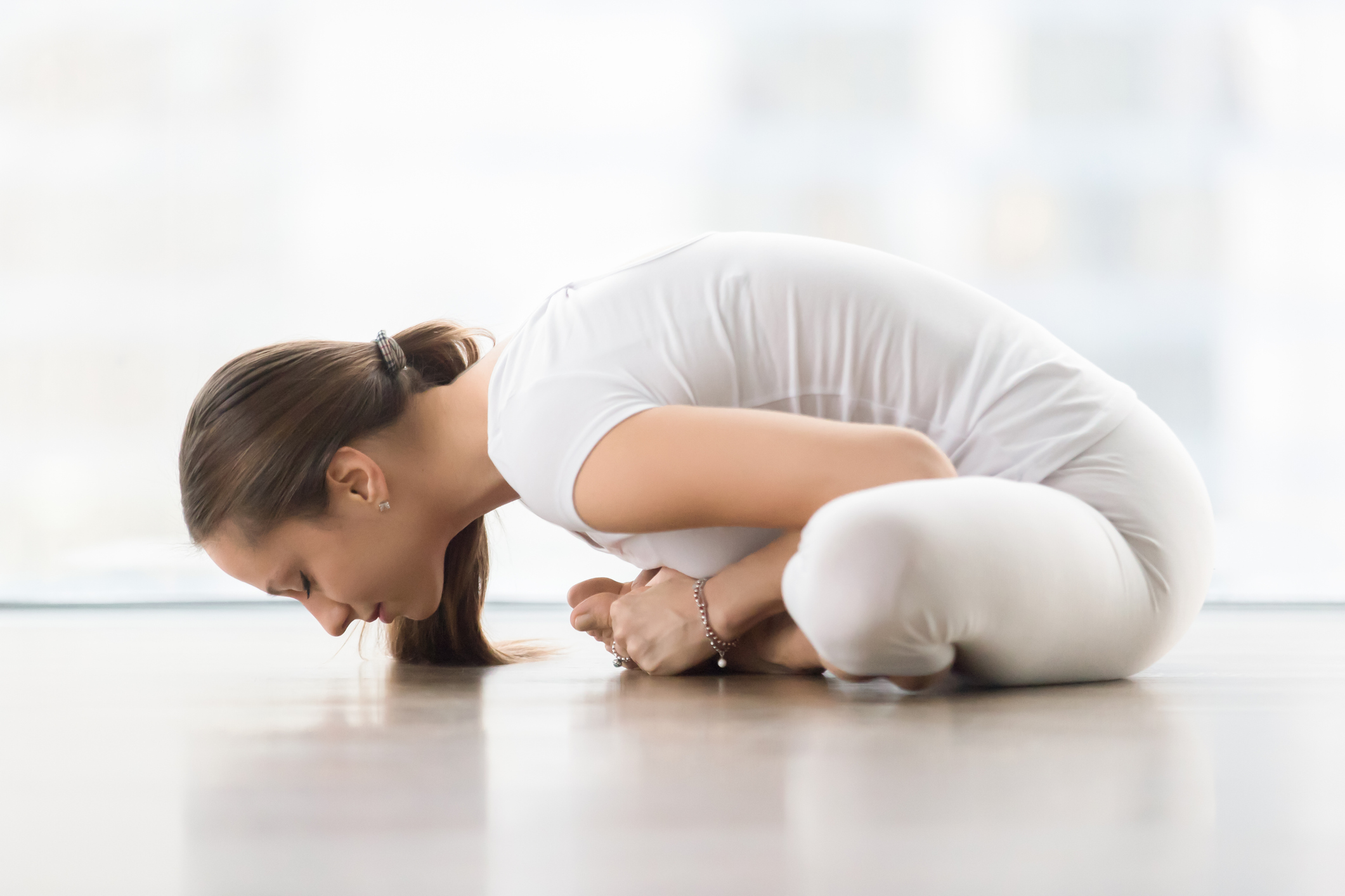 Woman Does Ashtanga Version of Baddha Konasana | Baddha Konasana