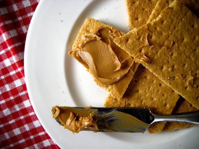 Plate of crackers with peanut butter | No sugar snacks added