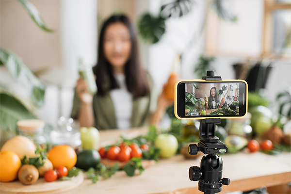 woman filming groceries | Orthorexia