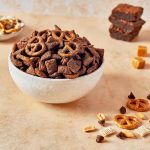 Chocolate Caramel Brownie Shakeology Muddy Buddies in a bowl