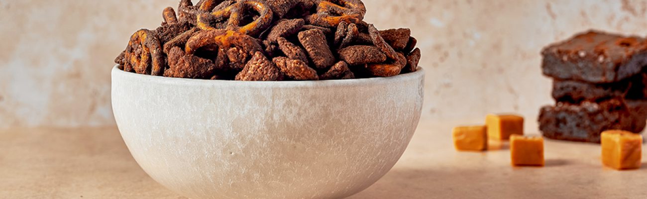 Chocolate Caramel Brownie Shakeology Muddy Buddies in a bowl