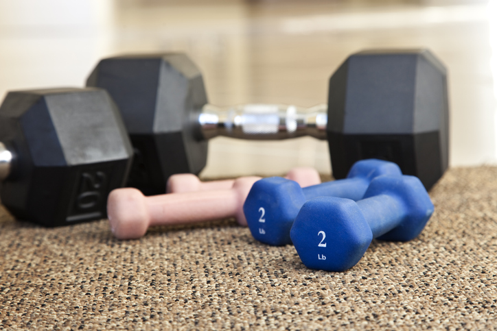 Image of Small Dumbbells Next to Heavier Weights | Deload Week