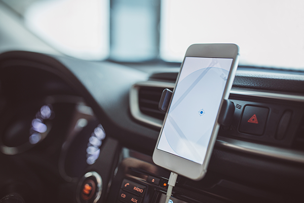 Phone on Dashboard Displaying Maps | Phone Addiction