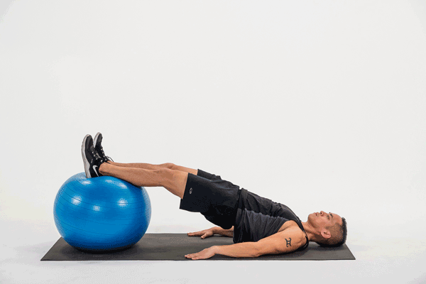 Man Does Stability Ball Hamstring Curl | balance exercises