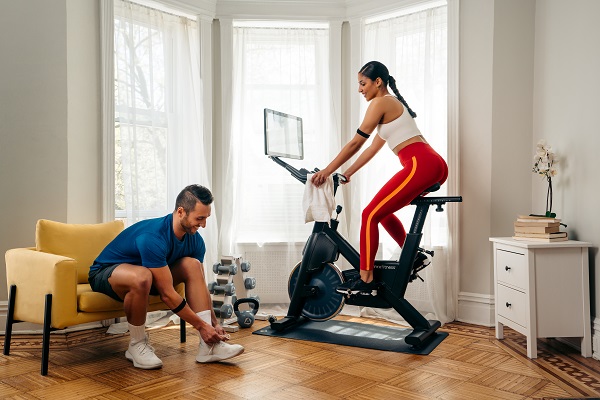 Woman Uses MYX Velocipede While Man Prepares for Run | Yin Yang Workouts