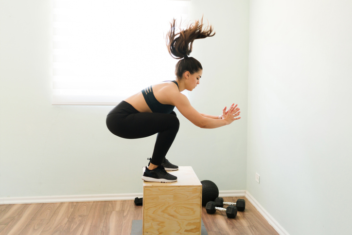 woman doing box jumps | box jumps