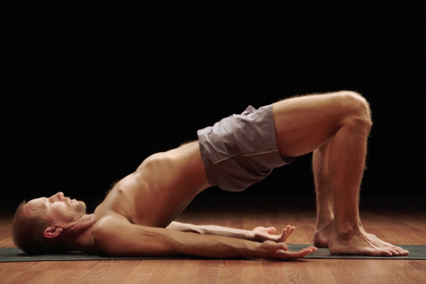 Trainer Holds Bridge Pose | Morning Yoga