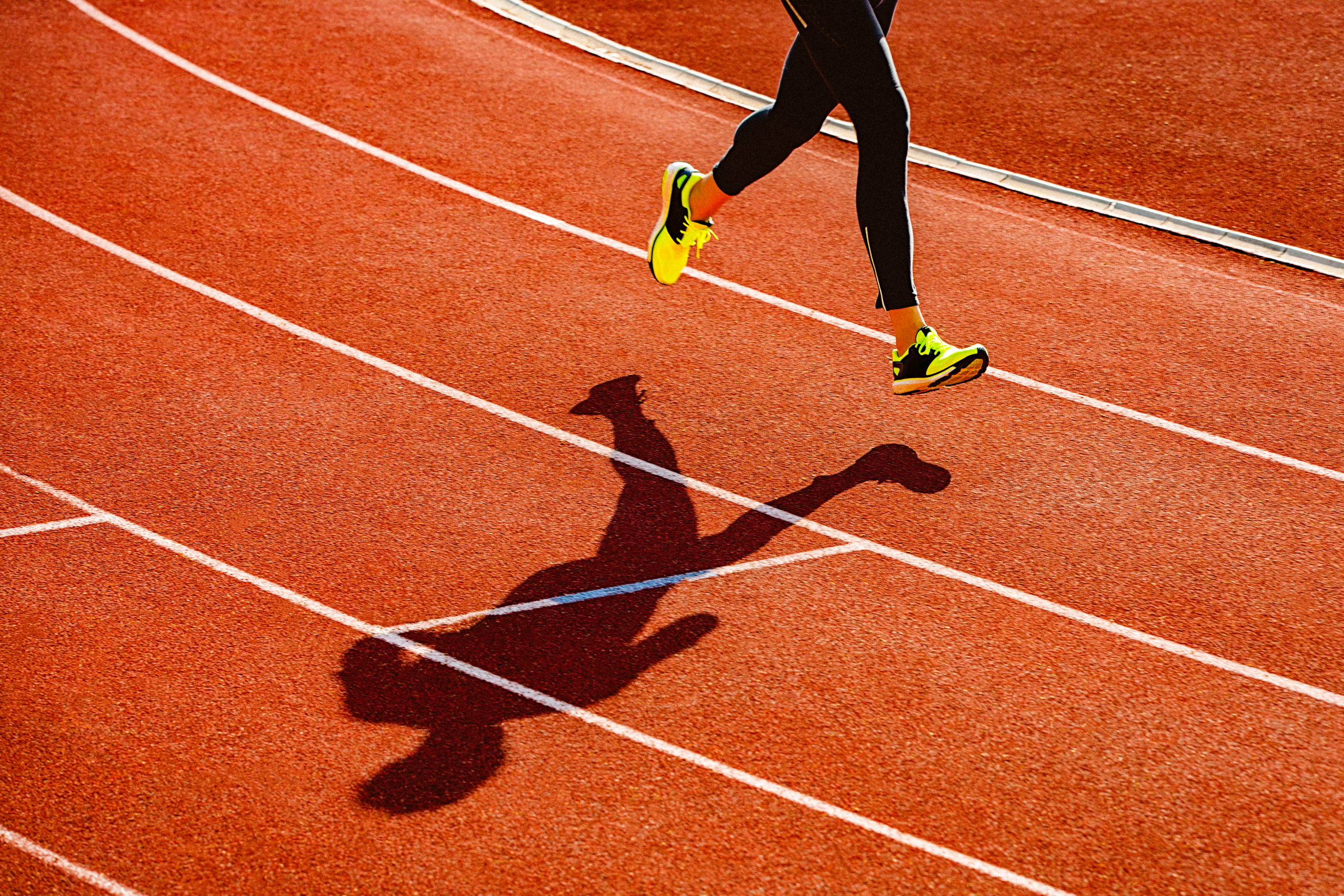 Runner Working Out on Track | how to make running less boring
