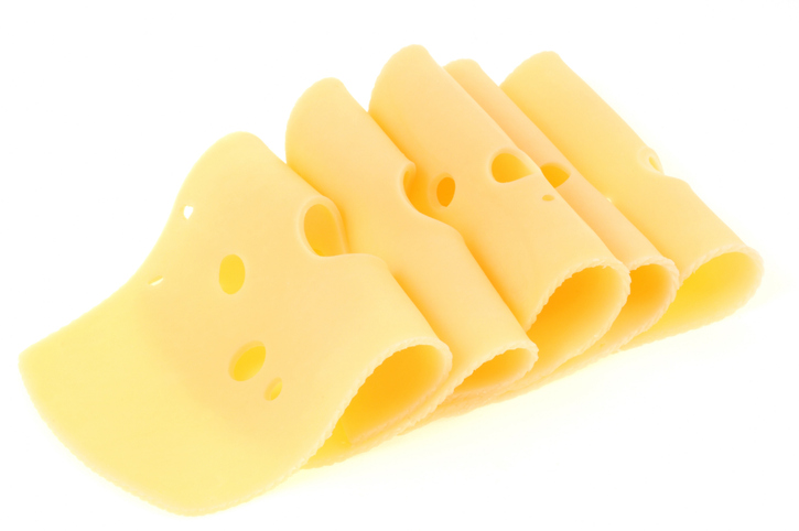 Isolated image of Swiss cheese | Foods rich in zinc