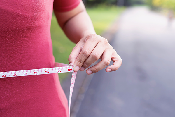 Woman Measures Waist on Road | Walking vs Running