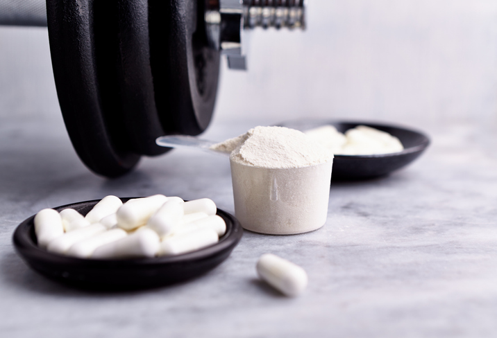 Creatine Supplements with Dumbbell | Creatine Loading