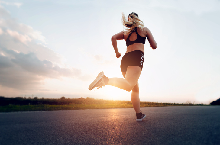 Back view of woman running