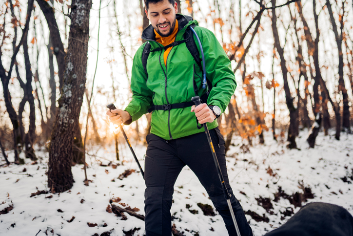 man hiking in snow | Vitamin D in Winter