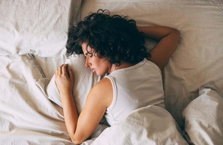 woman sleeping | How to Lower Cortisol Naturally