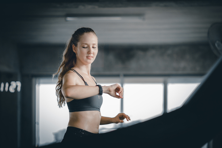 woman looking at fitness tracker | Cardio Zone 2