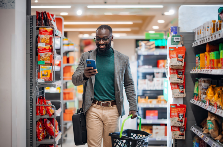 man grocery shopping | Ozempic Foods to Avoid