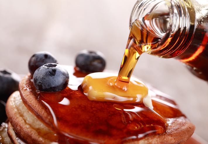 Maple syrup poured over pancakes Foods that increase blood sugar