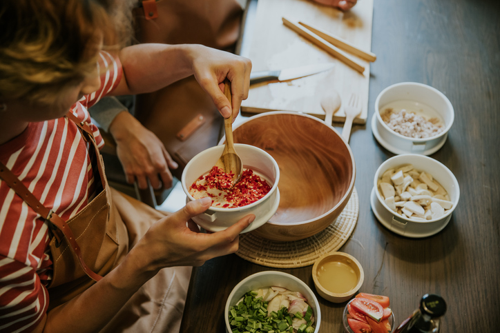 adding peppers to mixing bowl | How to Reduce Night Sweats?