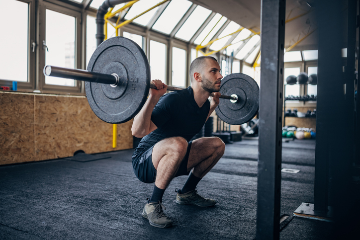 man doing barbell squat | Squat Depth