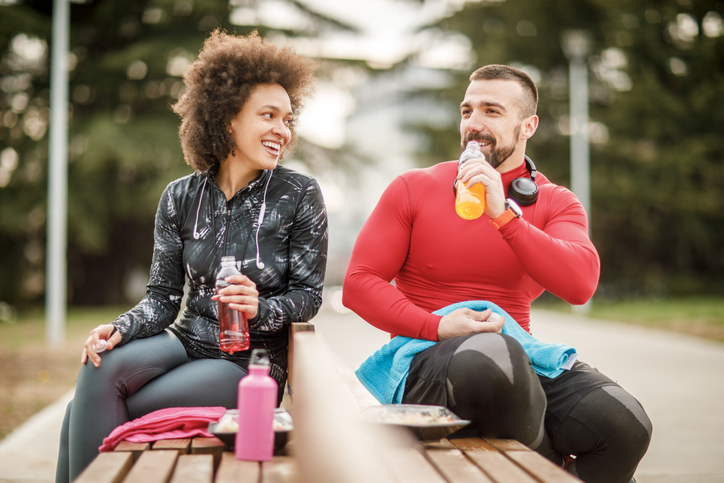 man and woman rehydrating | What is sweat made of?