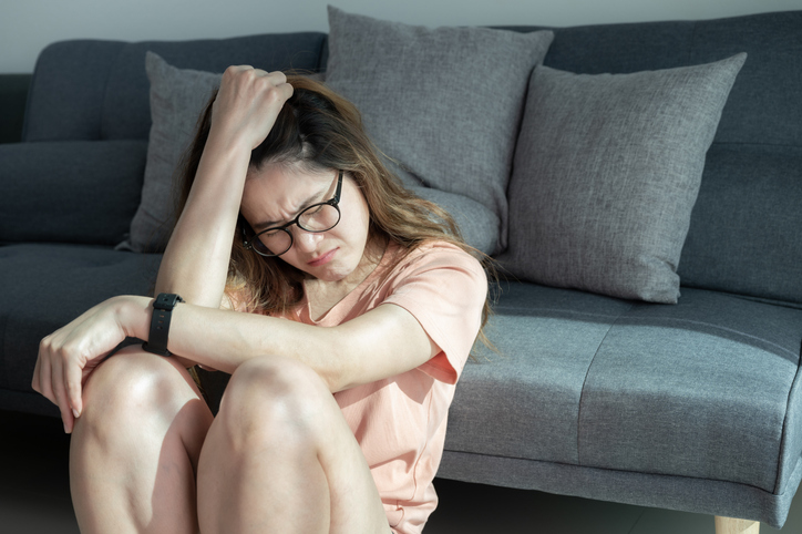 Stressed woman at home Mood swings