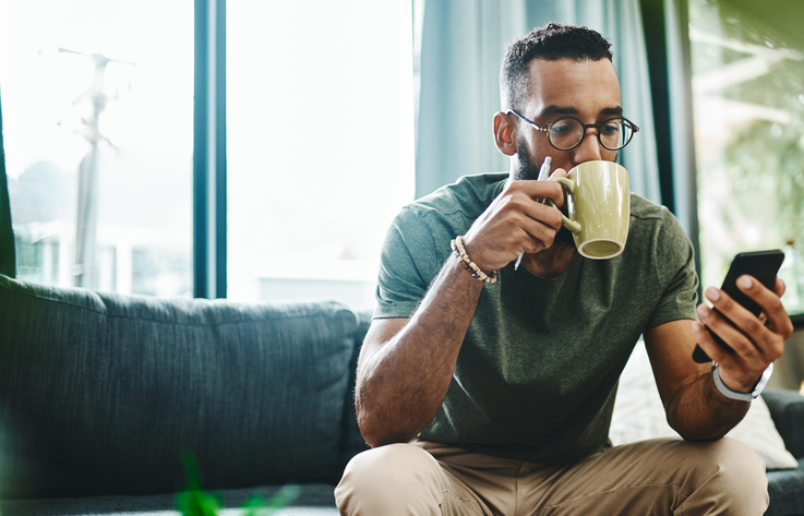 Man drinking coffee at home l-theanin