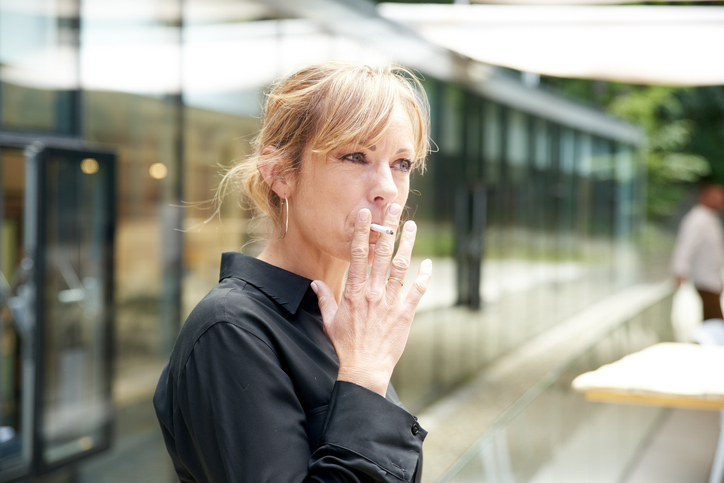 A woman who smokes outside How to increase sexual desire in women